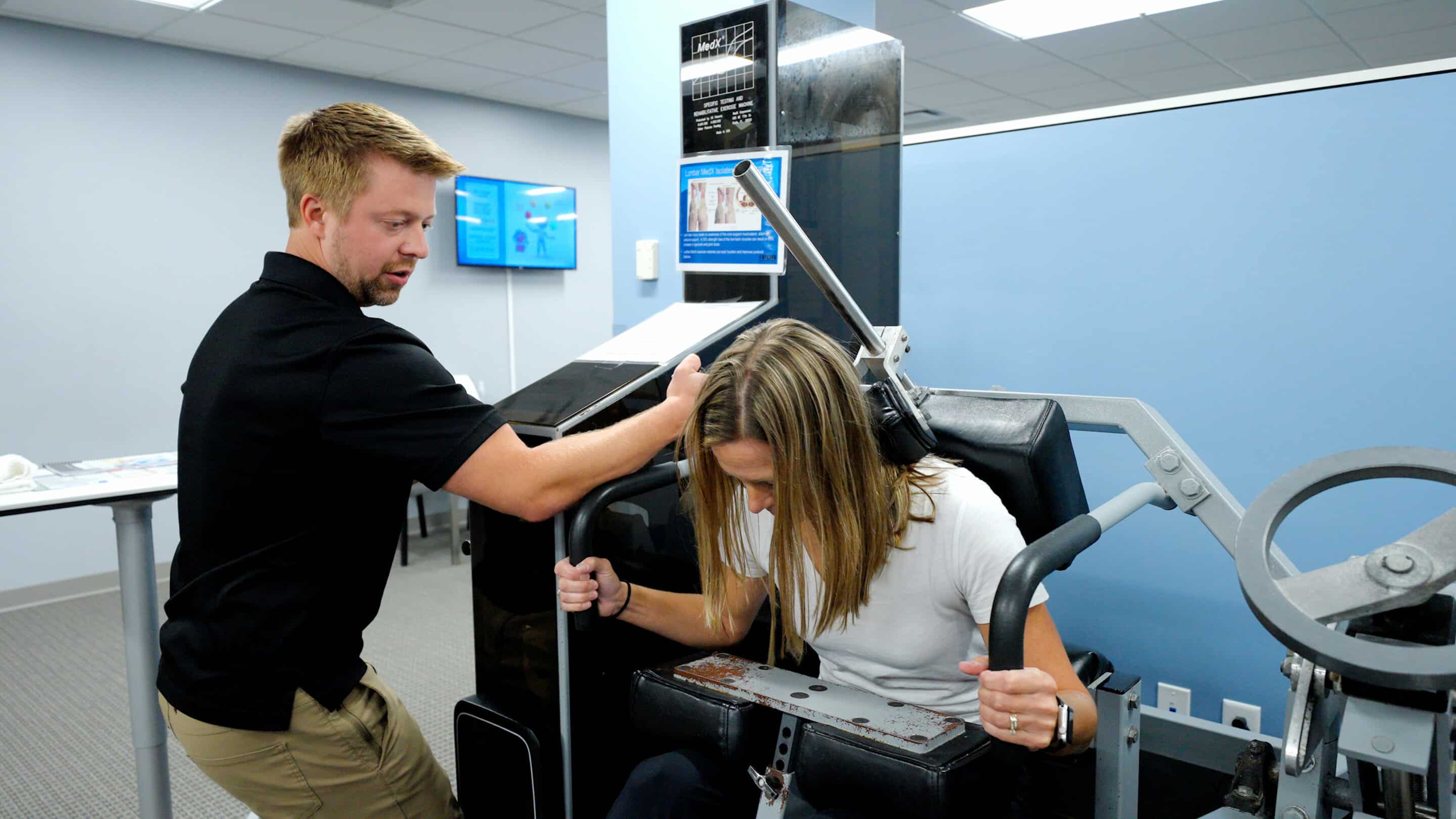 man speaks to doctor